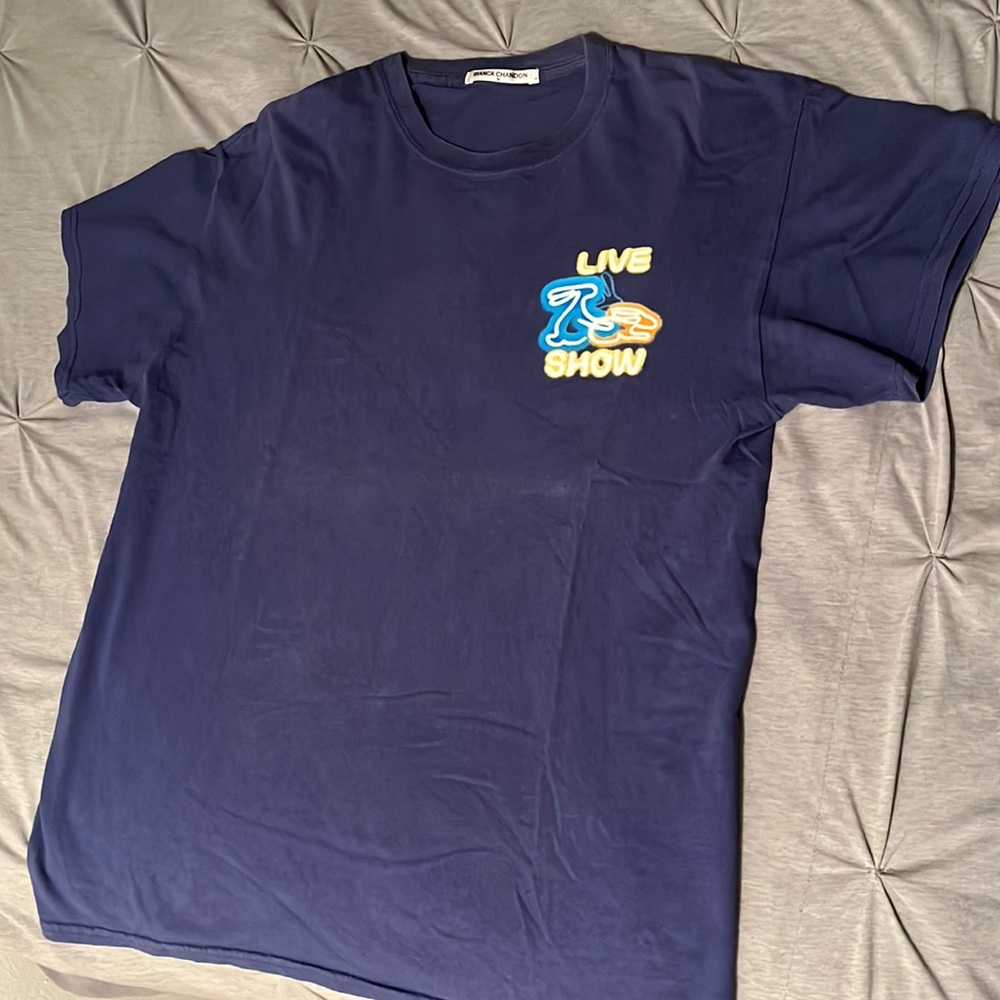 Bianca Chandon blue tee “live show” image on front